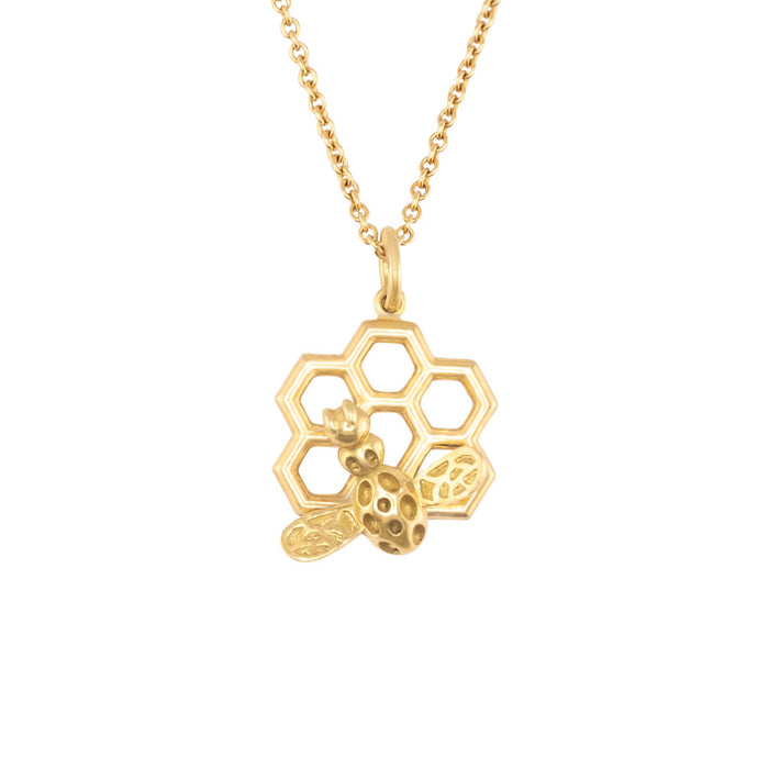 Bee on honeycomb necklace in 18K yellow gold on an 18-inch chain, inspired by the Fairmont Hotel rooftop beehive, handmade in San Francisco