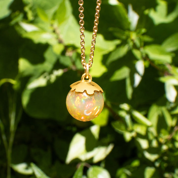 Organic berry opal necklace with a hand-picked Ethiopian opal ball in 18K yellow gold on an 18-inch cable chain, handmade in San Francisco