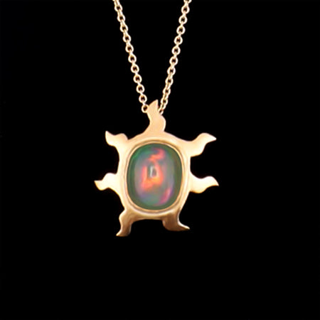 Sun opal necklace with a 2.34-carat Ethiopian opal in a hammered 18K yellow gold sun pendant on an 18-inch cable chain, handmade in San Francisco