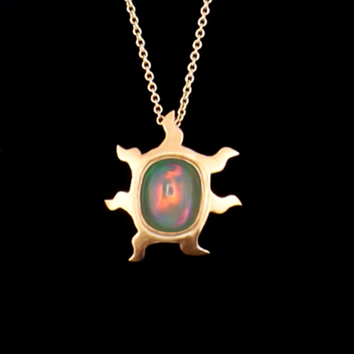 Sun opal necklace with a 2.34-carat Ethiopian opal in a hammered 18K yellow gold sun pendant on an 18-inch cable chain, handmade in San Francisco