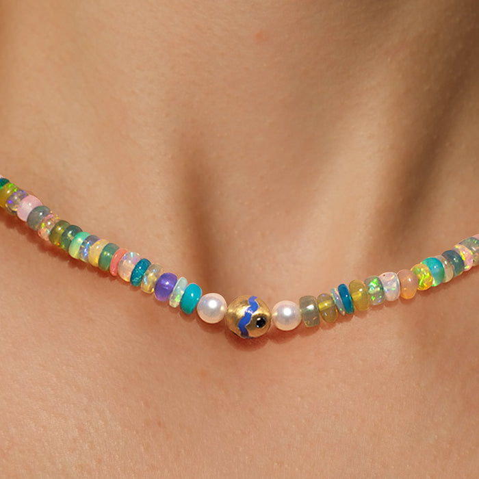 Blue opal matte sapphire necklace with Ethiopian opals, Akoya pearls, and 18K yellow gold enamel ball with sapphires, handmade in San Francisco