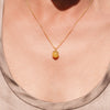 Organic berry opal necklace with a hand-picked Ethiopian opal ball in 18K yellow gold on an 18-inch cable chain, handmade in San Francisco