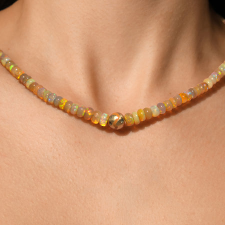 Orange opal matte sapphire necklace with 44.44 carats of Ethiopian opals and an 18K yellow gold enamel ball with multi-colored sapphires, handmade in San Francisco