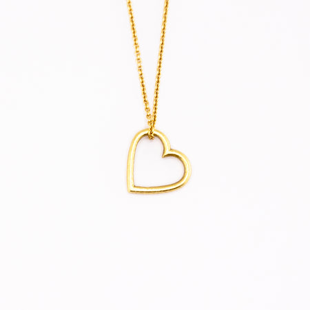 Tiny hammered texture heart necklace in 18K yellow gold, 10.65mm wide, on a fine 18-inch cable chain, handmade in San Francisco by Cup and Belle
