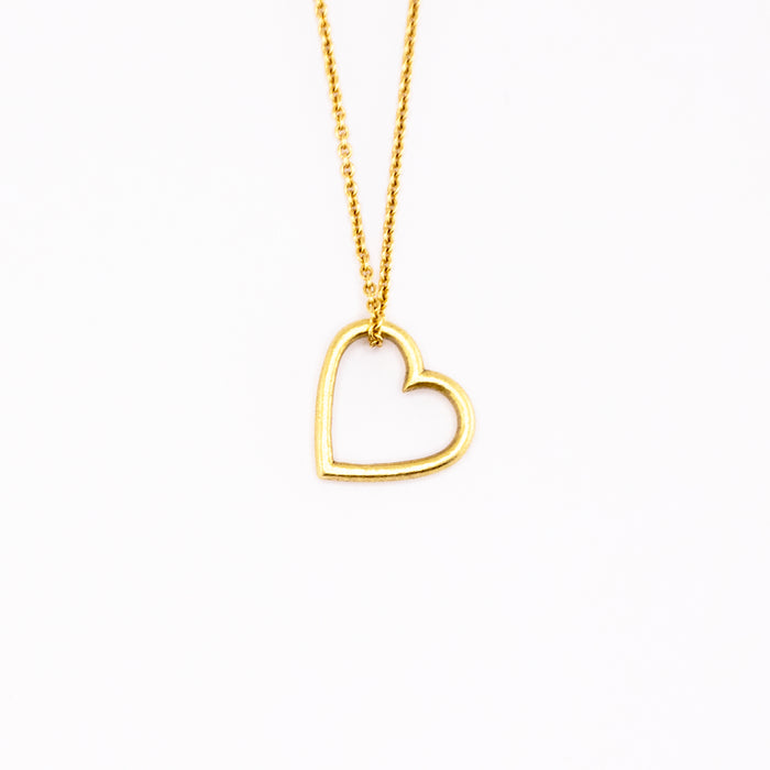 Tiny hammered texture heart necklace in 18K yellow gold, 10.65mm wide, on a fine 18-inch cable chain, handmade in San Francisco by Cup and Belle